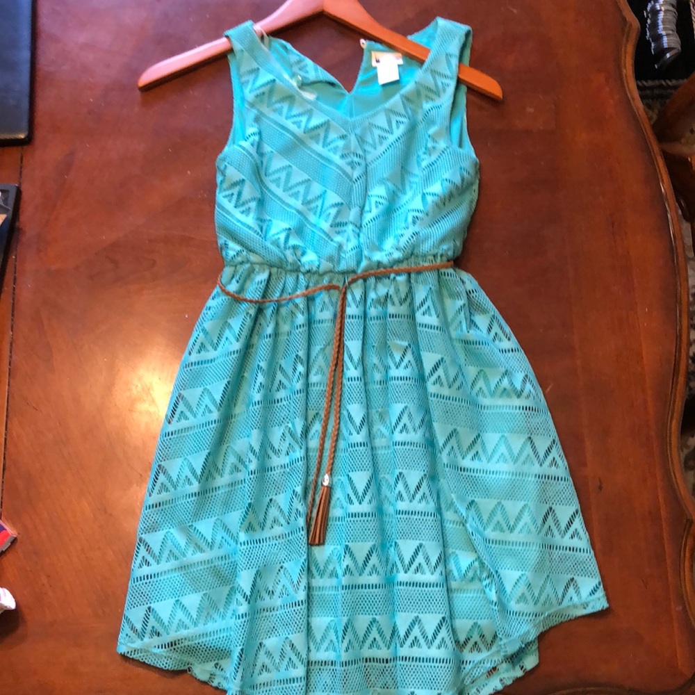 A beautiful gently used Emily West dress. Perfect as casual or formal wear!